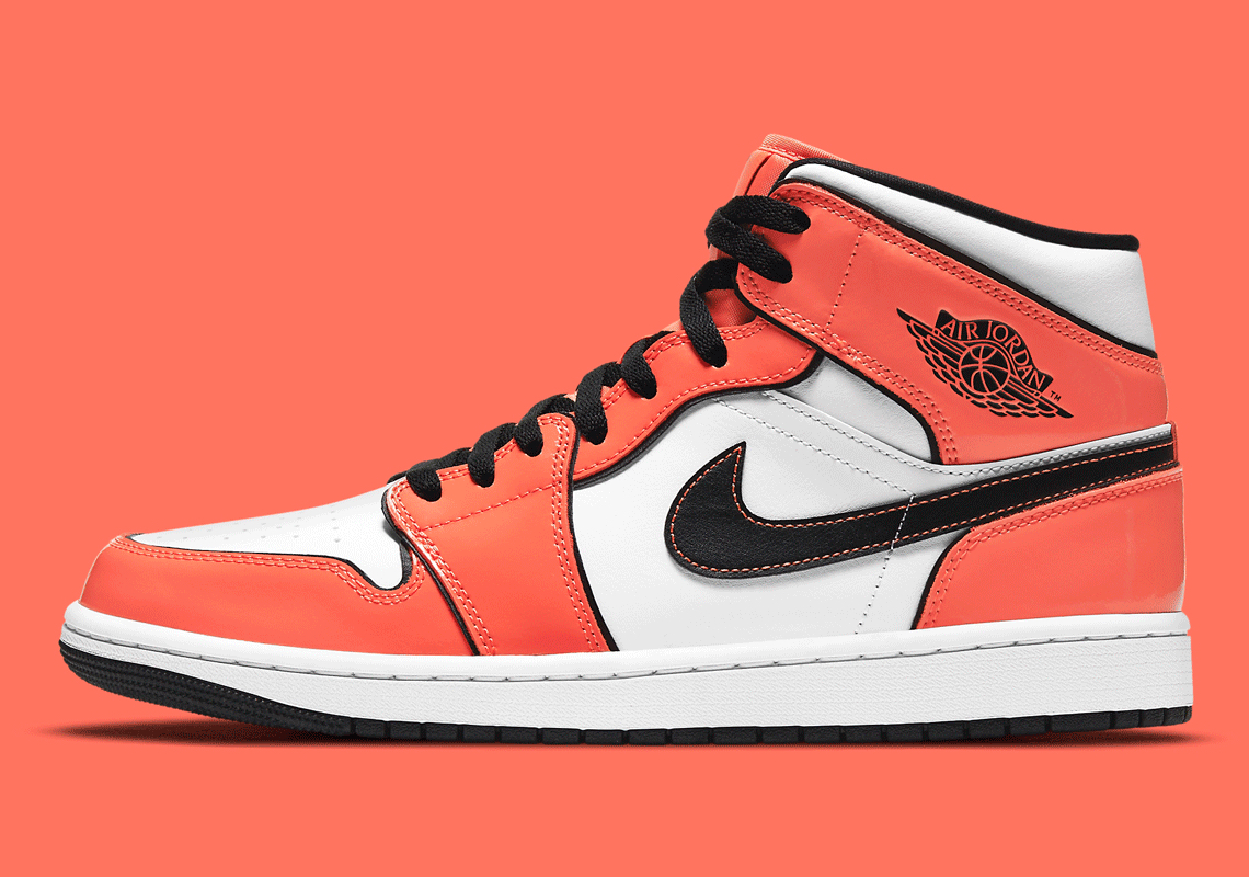 orange black and white jordan 1 grade school