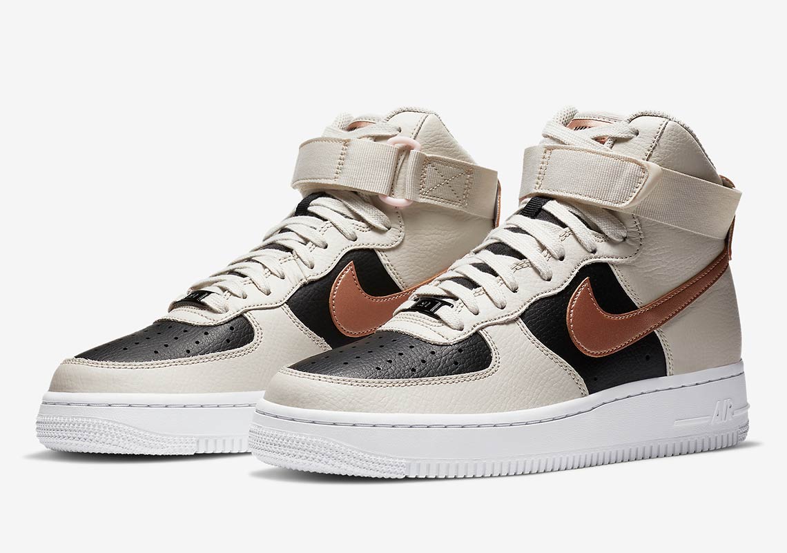 The Nike Air Force 1 High Combines Sail And Black Uppers With Metallic Bronze
