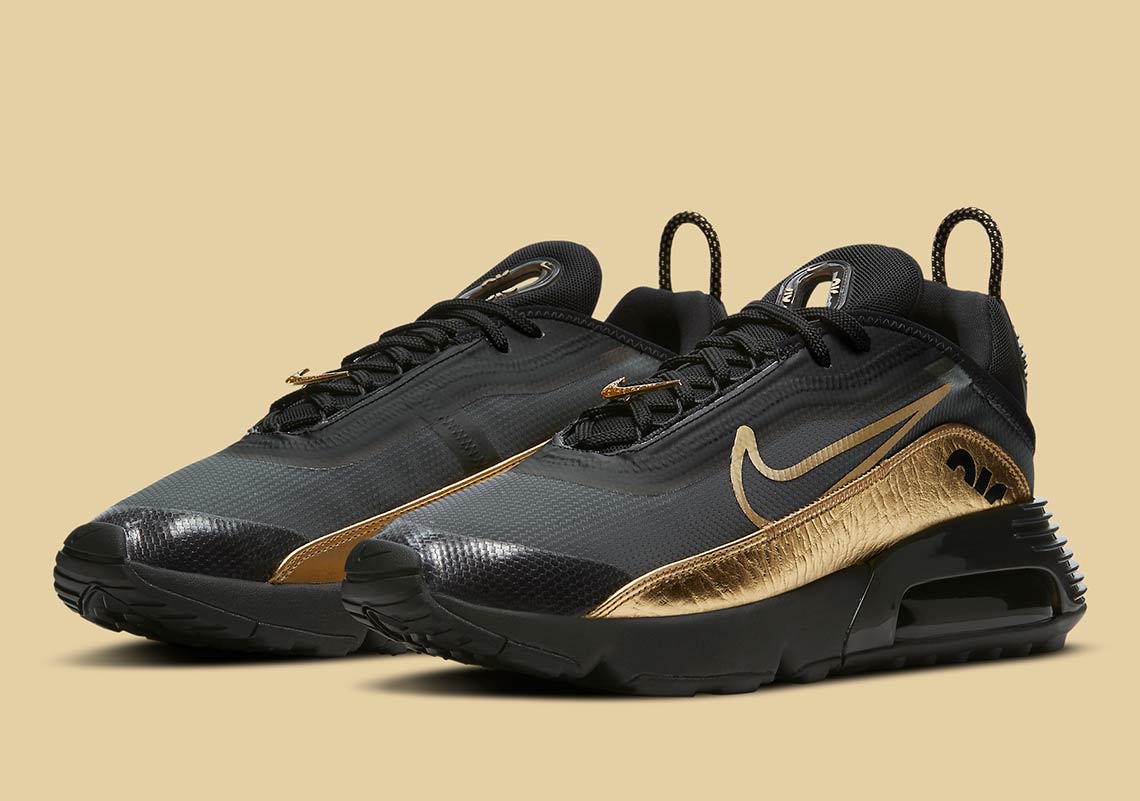nike gold and black sneakers