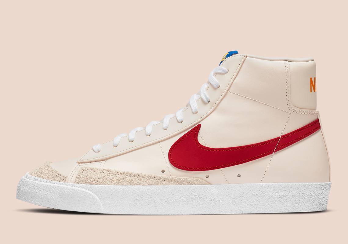 The Nike Blazer Mid '77 Features A Guava Ice Base With Colored Accents