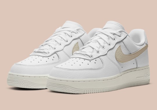 The Women’s Nike Air Force 1 Low “Light Bone” Features Swoosh Stencils