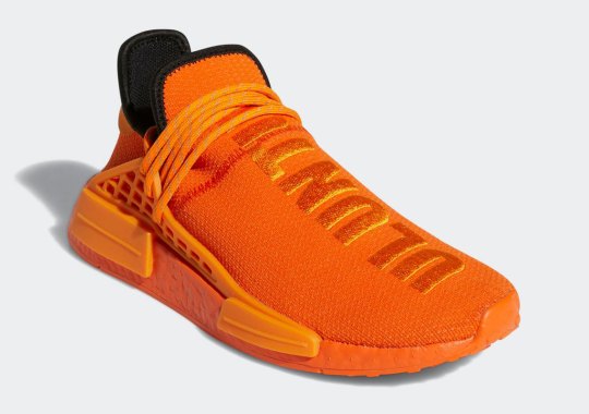 The Pharrell x adidas NMD Hu “ULUNTU” Further Surfaces In Alternate Orange Colorway