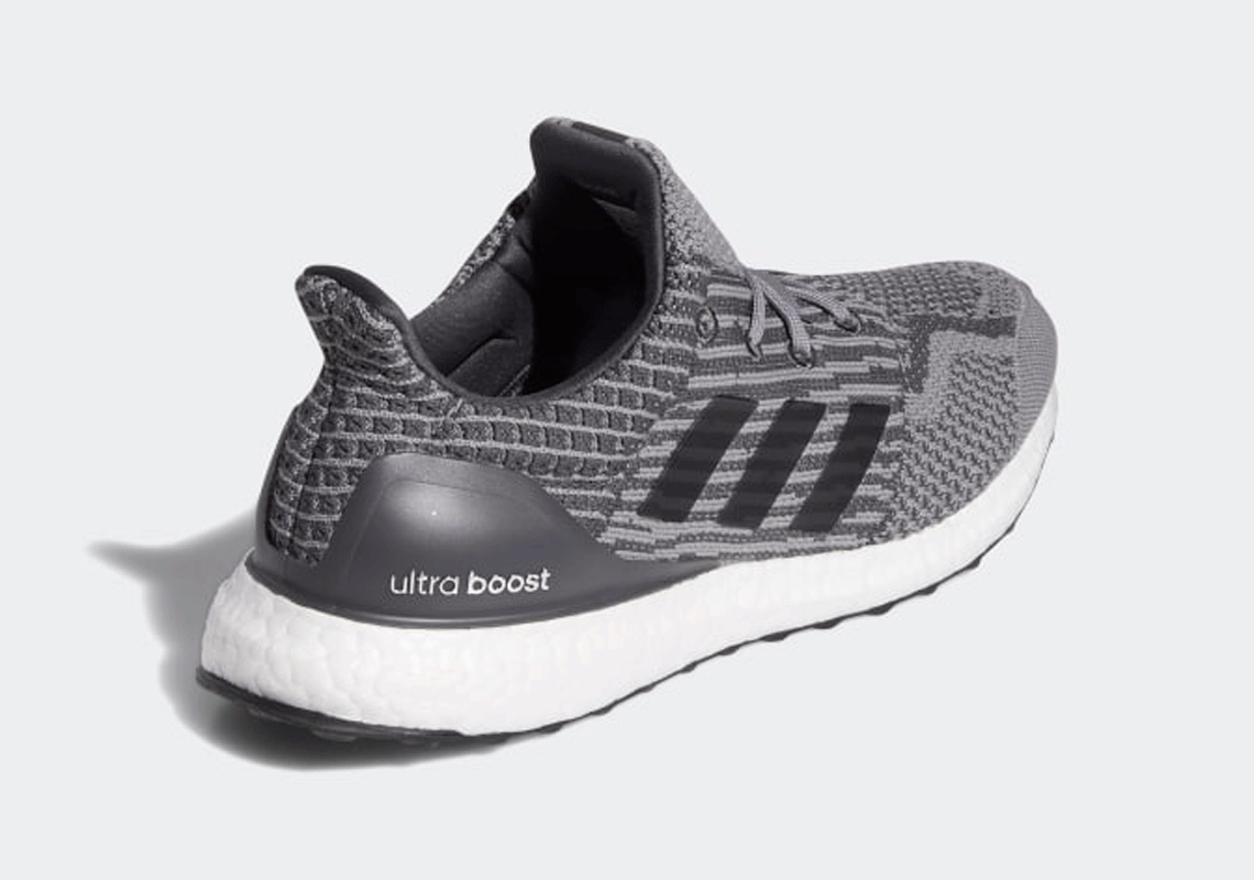 grey uncaged ultra boost on feet