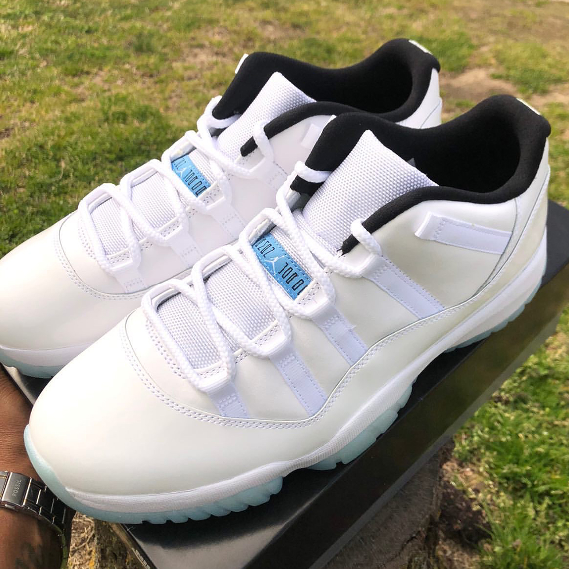 white and blue low 11s