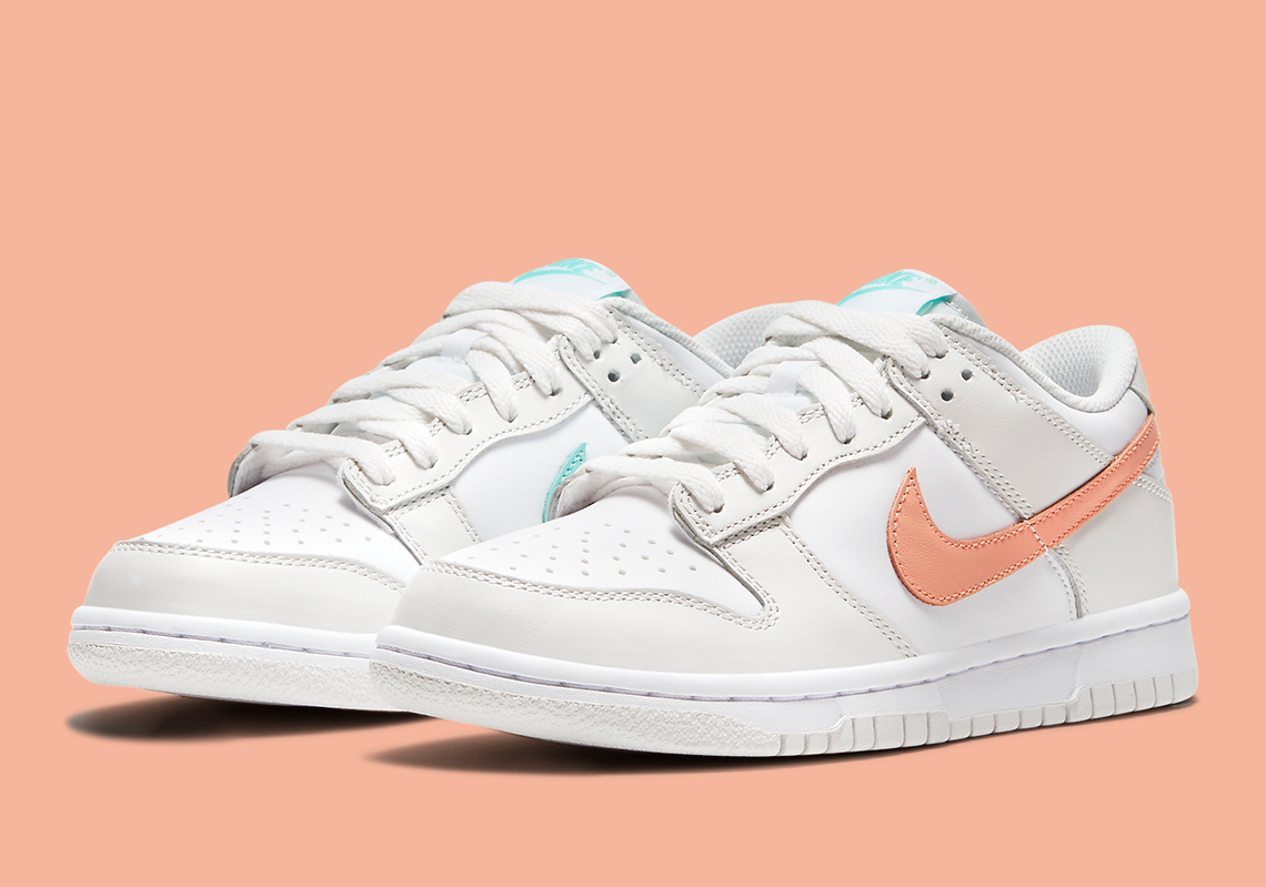 peach and white nike shoes
