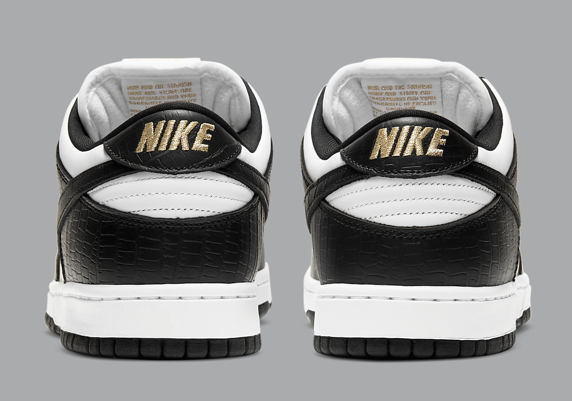 Supreme Nike SB Dunk Low White Black DH3228-102 | SneakerNews.com