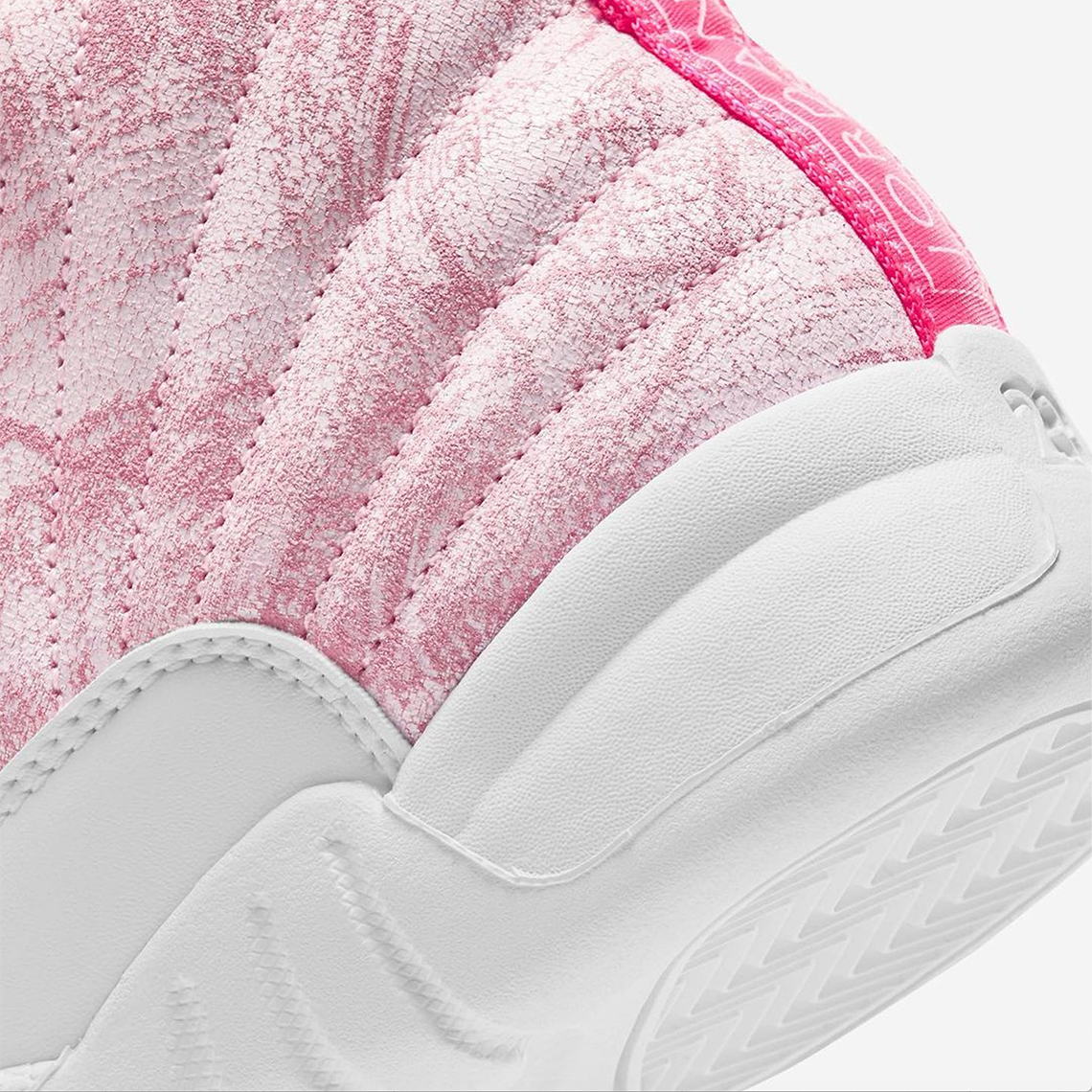 pink and white jordans 12