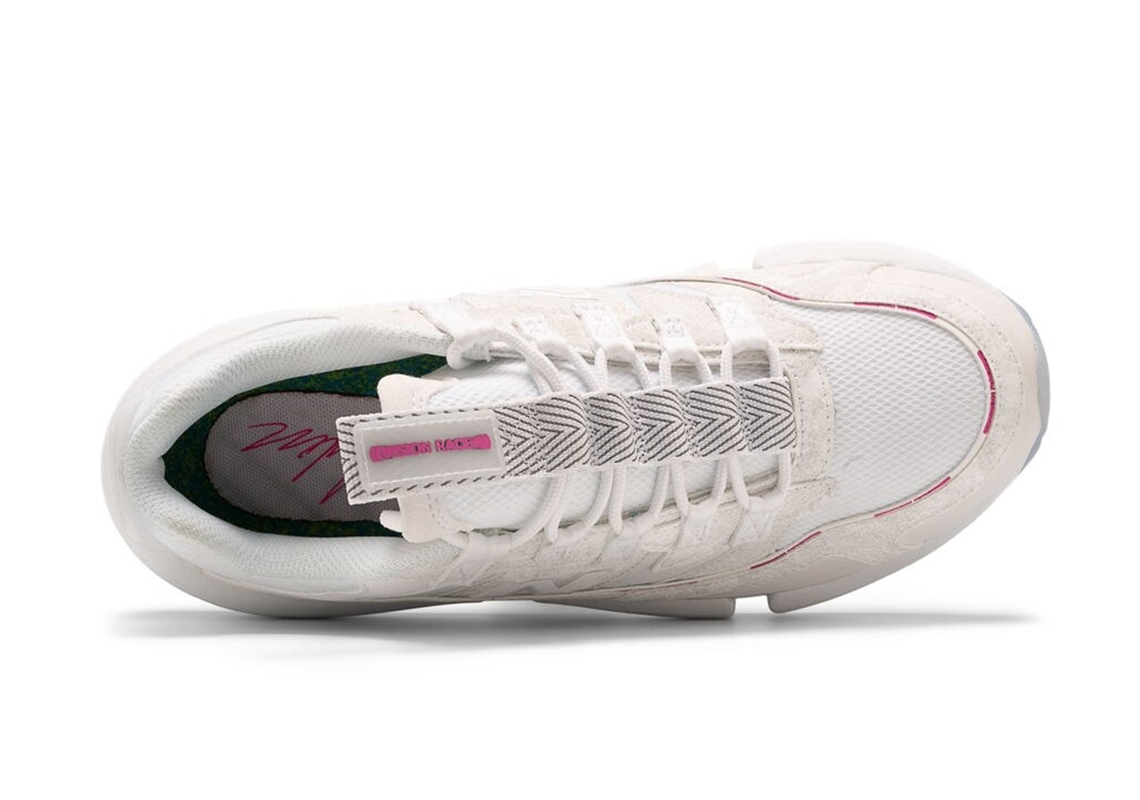 white and pink new balance shoes