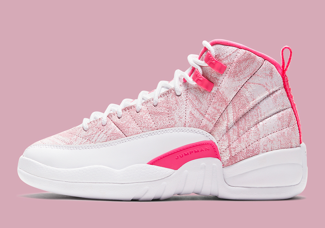 white and pink jordan 12