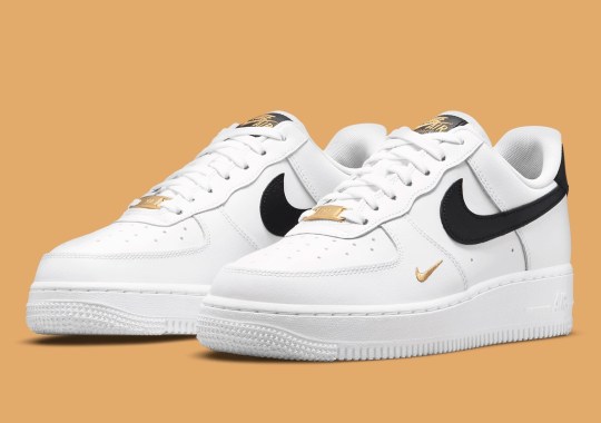 Nike Hits This Clean “White/Black” Air Force 1 With Gold Mini-Swooshes