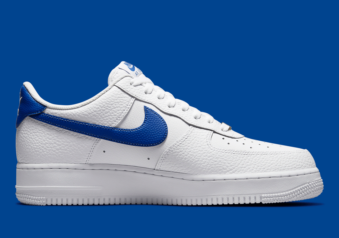 white and royal blue air force ones