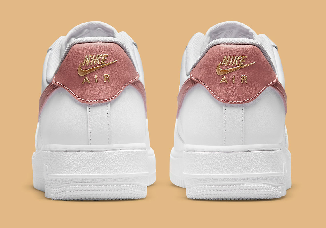 white and rose gold nike air force