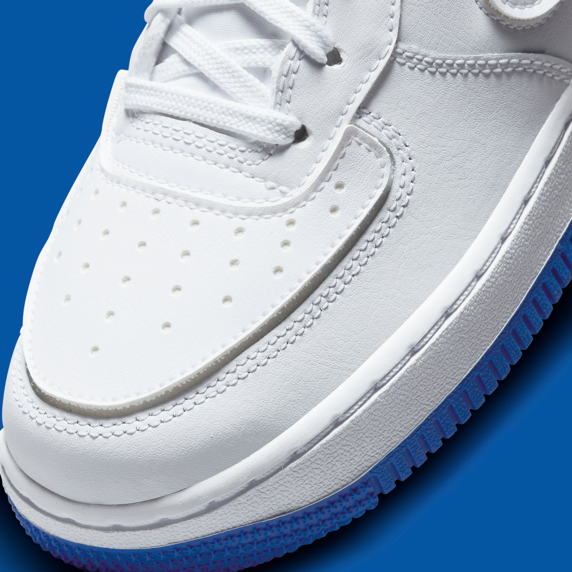 white air force 1 blue bottom