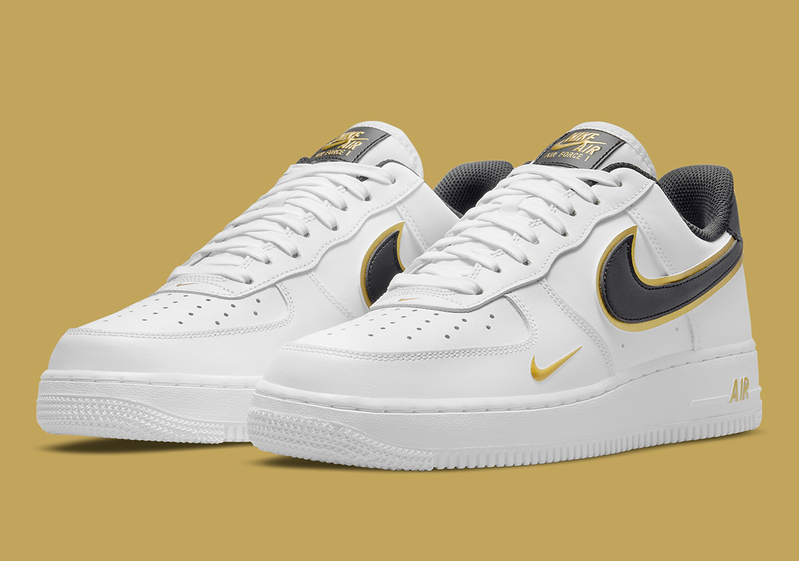 Nike af1 gold shop swoosh