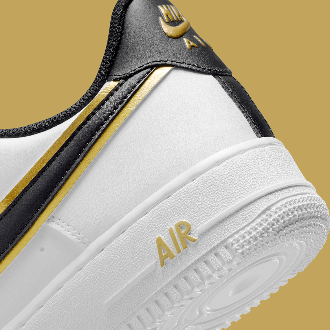 nike gold swoosh