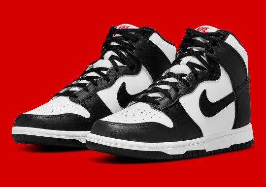 The Nike Dunk High Appears In Black And White With Red Logos