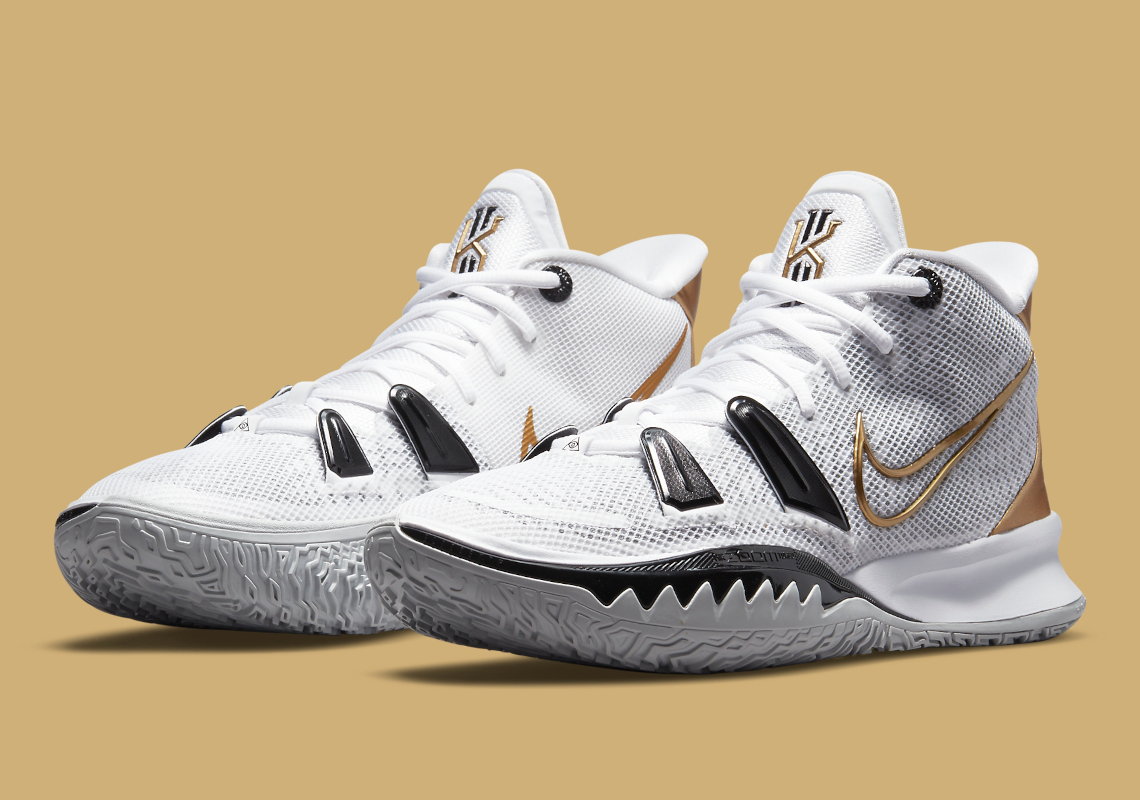 kyrie irving shoes black and gold