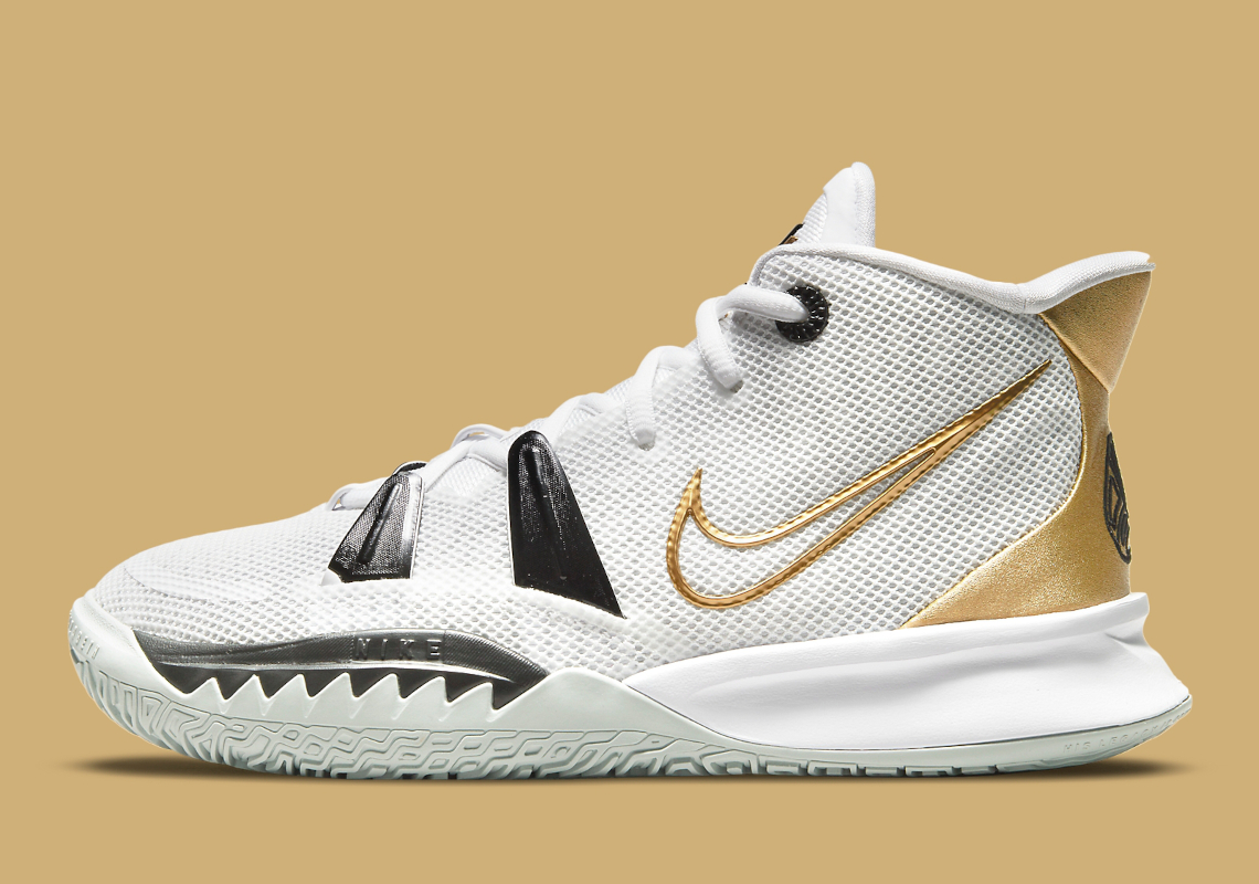 kyrie shoes gold and black