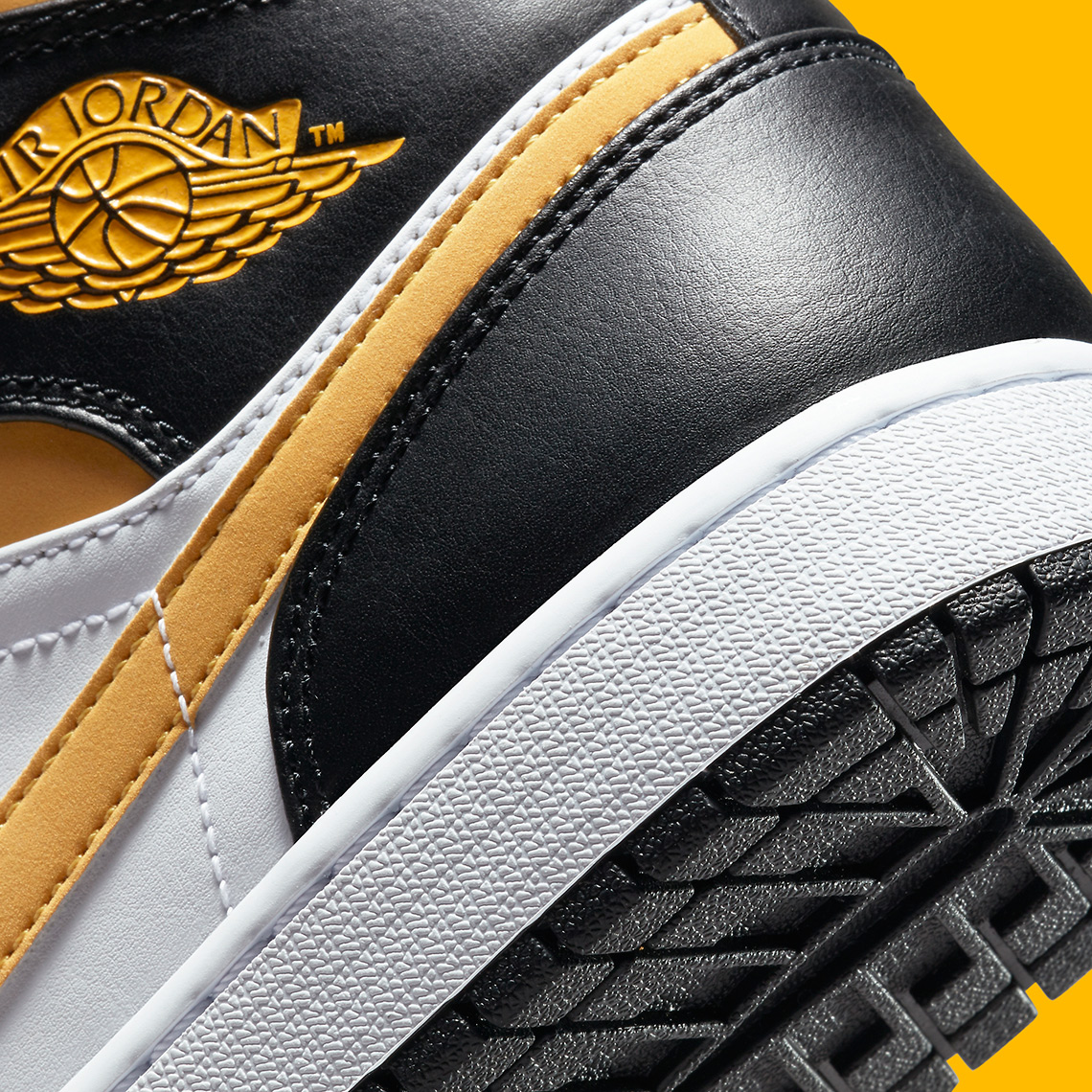 university gold jordan 1