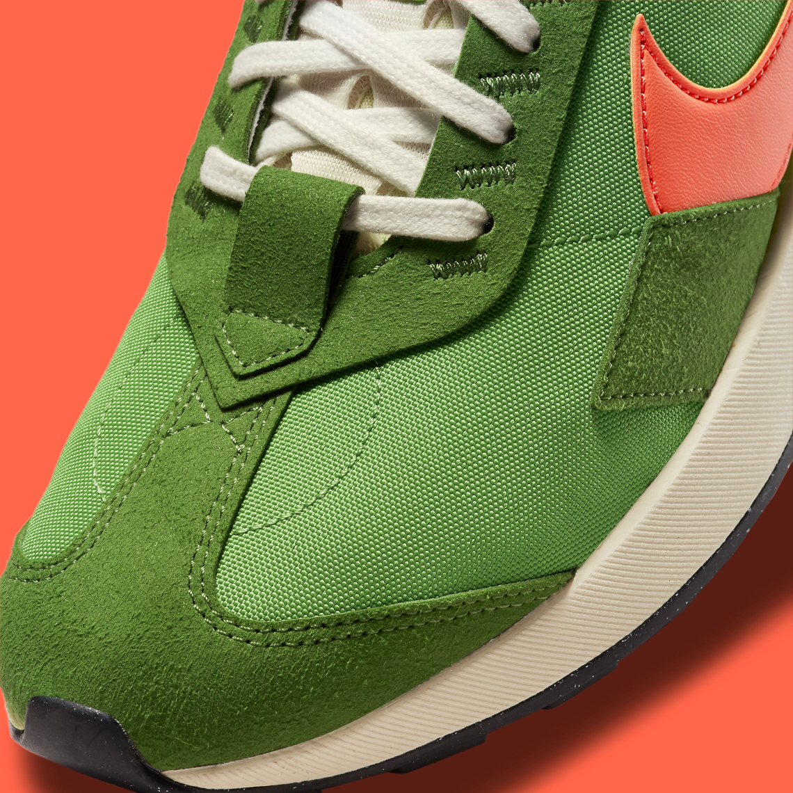 green and orange nike shoes