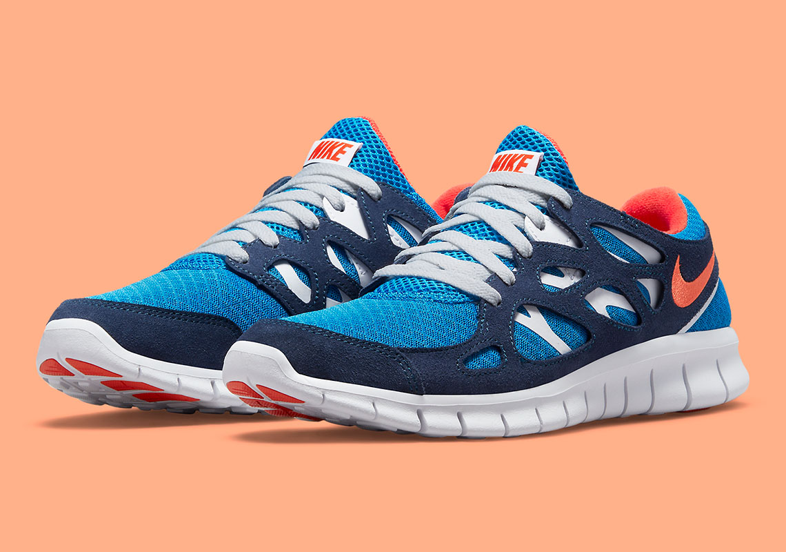 A Sporty Blue And Orange Appear On The Nike Free Run 2 Retro