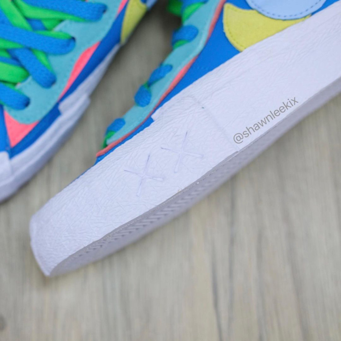 sacai kaws nike blazer low