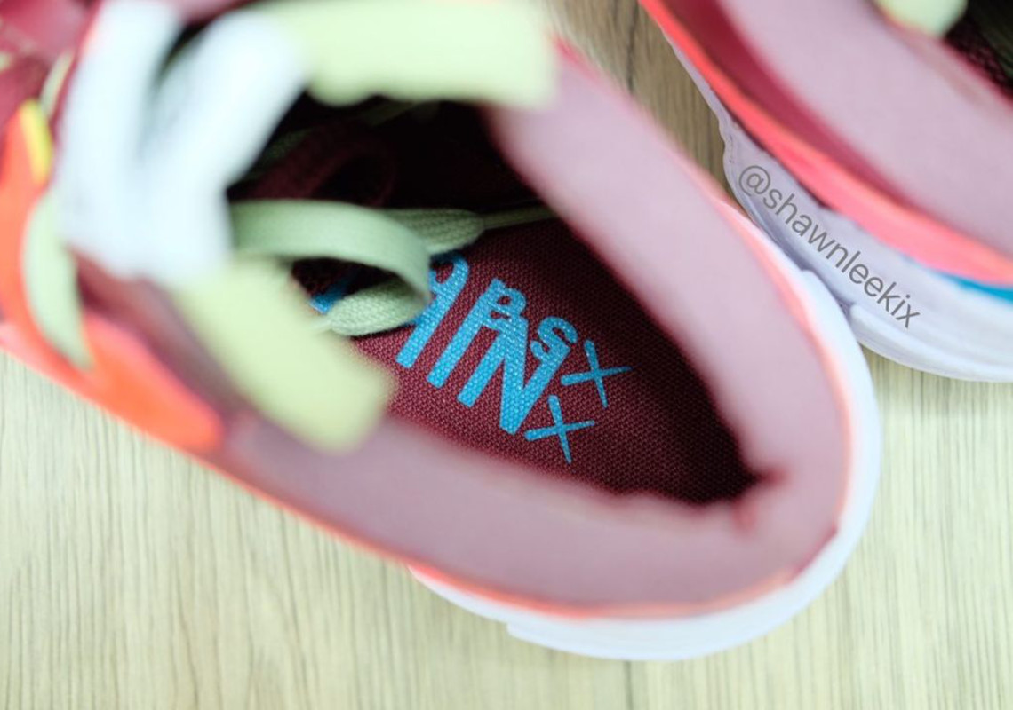 sacai kaws nike blazer low