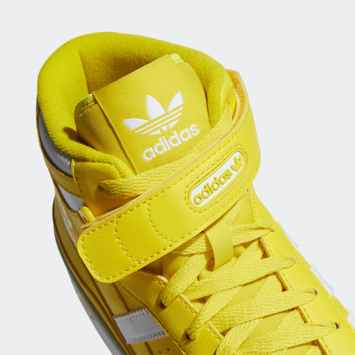 forum mid shoes yellow