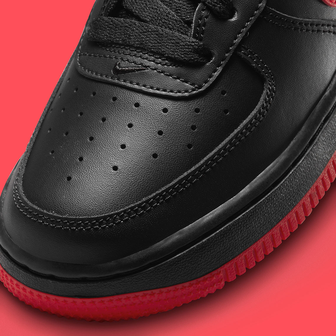 black high top air force ones with red bottom