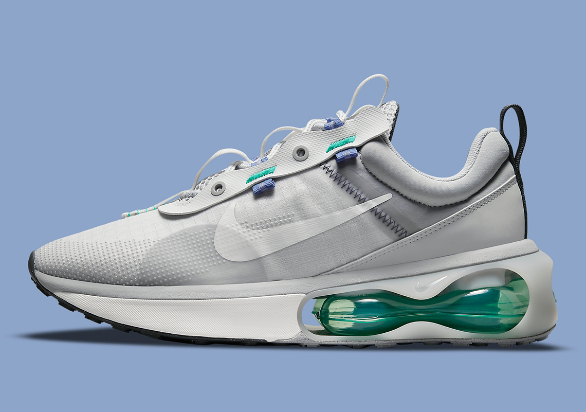 Green And Blue Accents Jump Off This Grey-Dominant Nike Air Max 2021