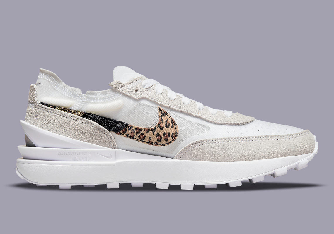 white nike with leopard check