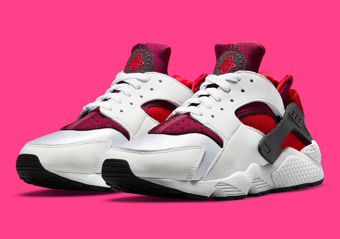 A Splash Of Berry Tones Appears On A Women’s Nike Air Huarache