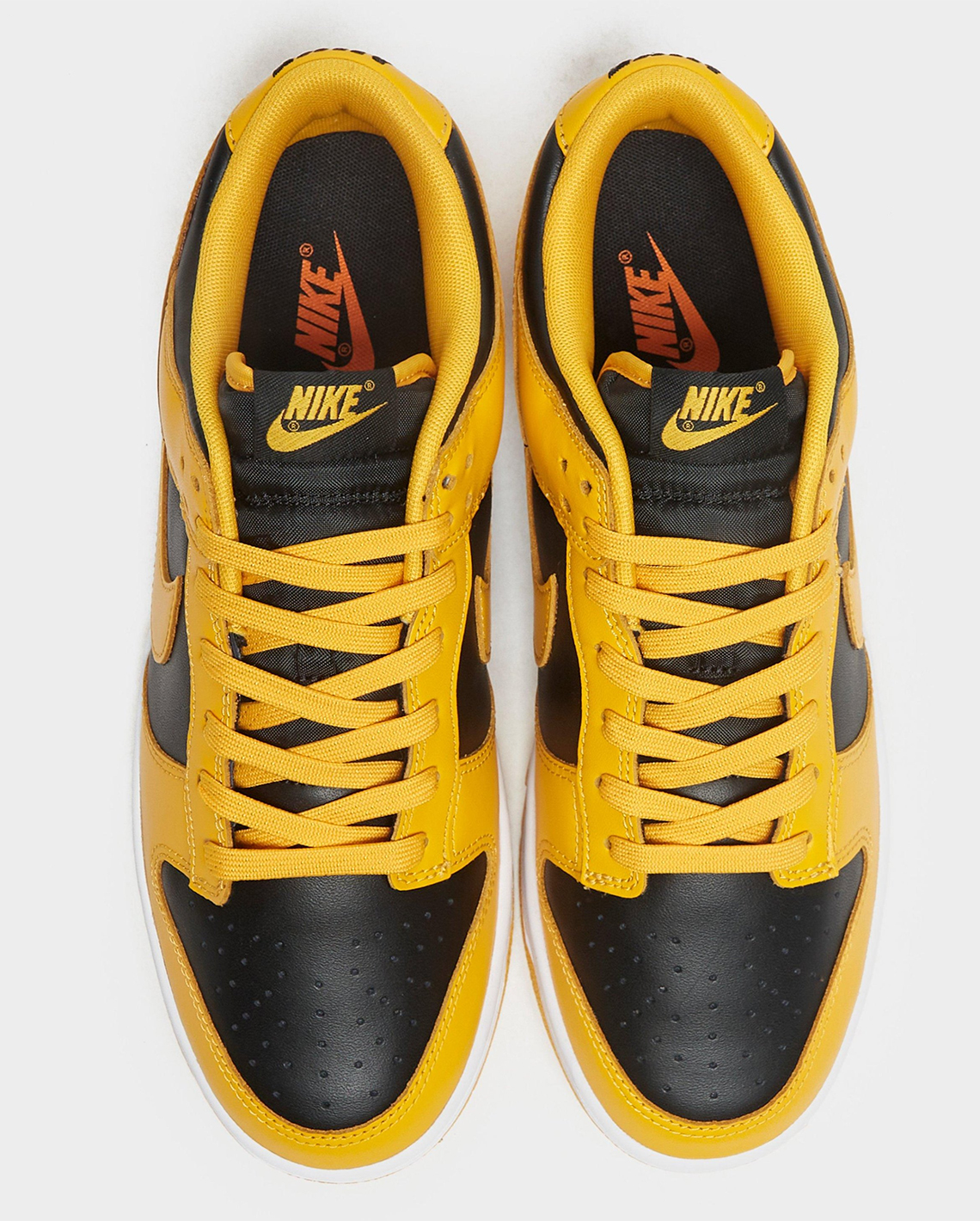 Nike Dunk Low Iowa Black Goldenrod White DD1391-004 | SneakerNews.com