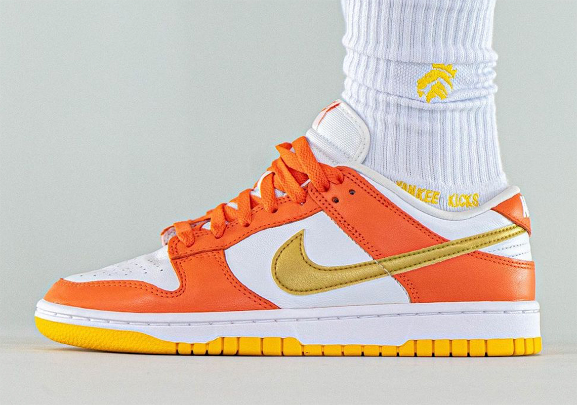 The Nike Dunk Low Laments The End Of Summer In "Golden Orange"