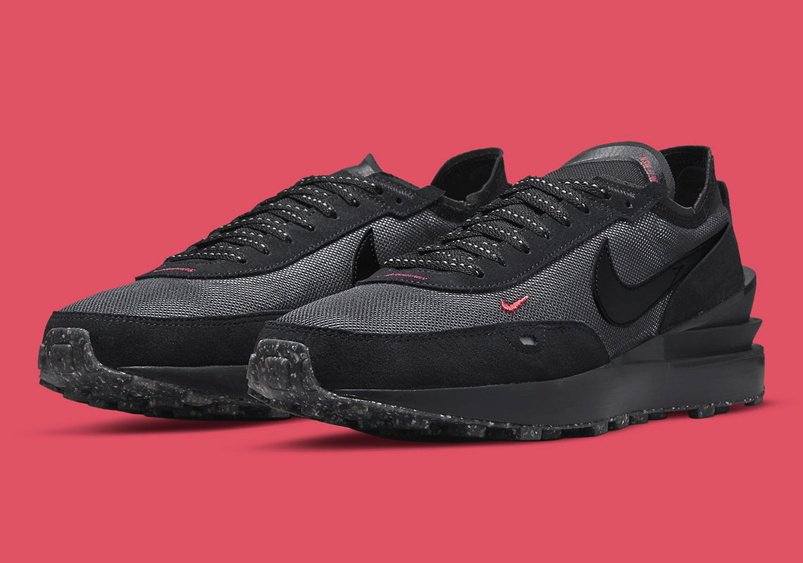 The Slightest Hints Of Red Fire Up This All-Black Nike Waffle One