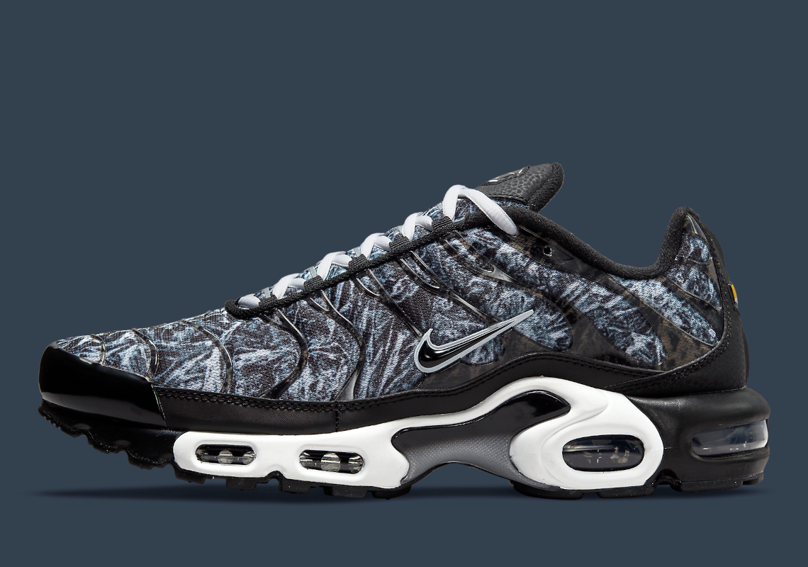 A Wild Camouflage Pattern Covers This Black And White Nike Air Max Plus