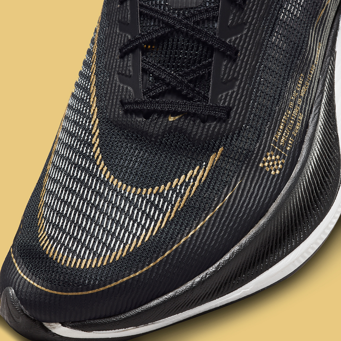 Nike Zoom VaporFly NEXT Black Gold CU4111-001 | SneakerNews.com