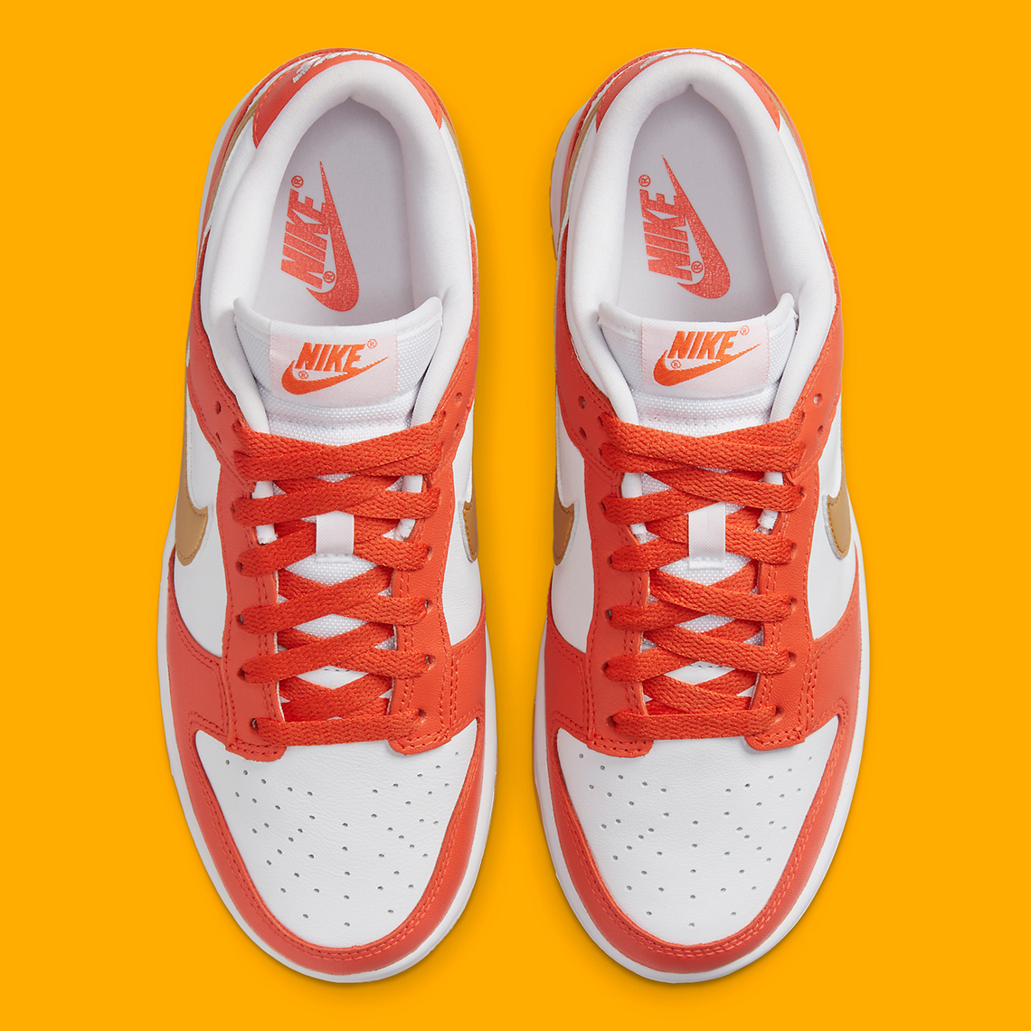 Oranges And Golds Set On The Nike Dunk Low - SneakerNews.com