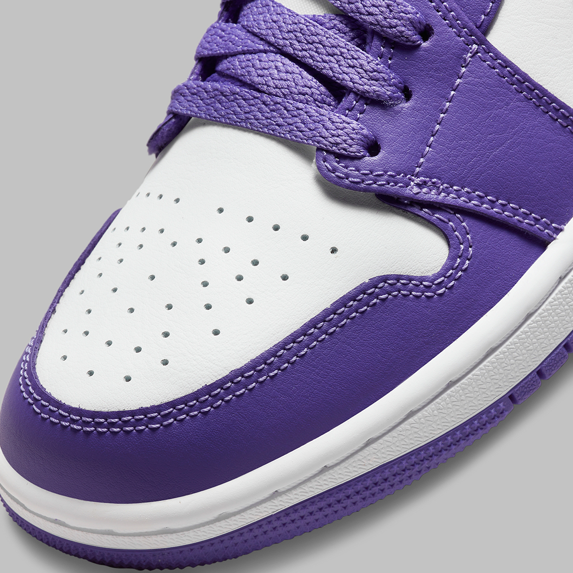 purple and white low top ones