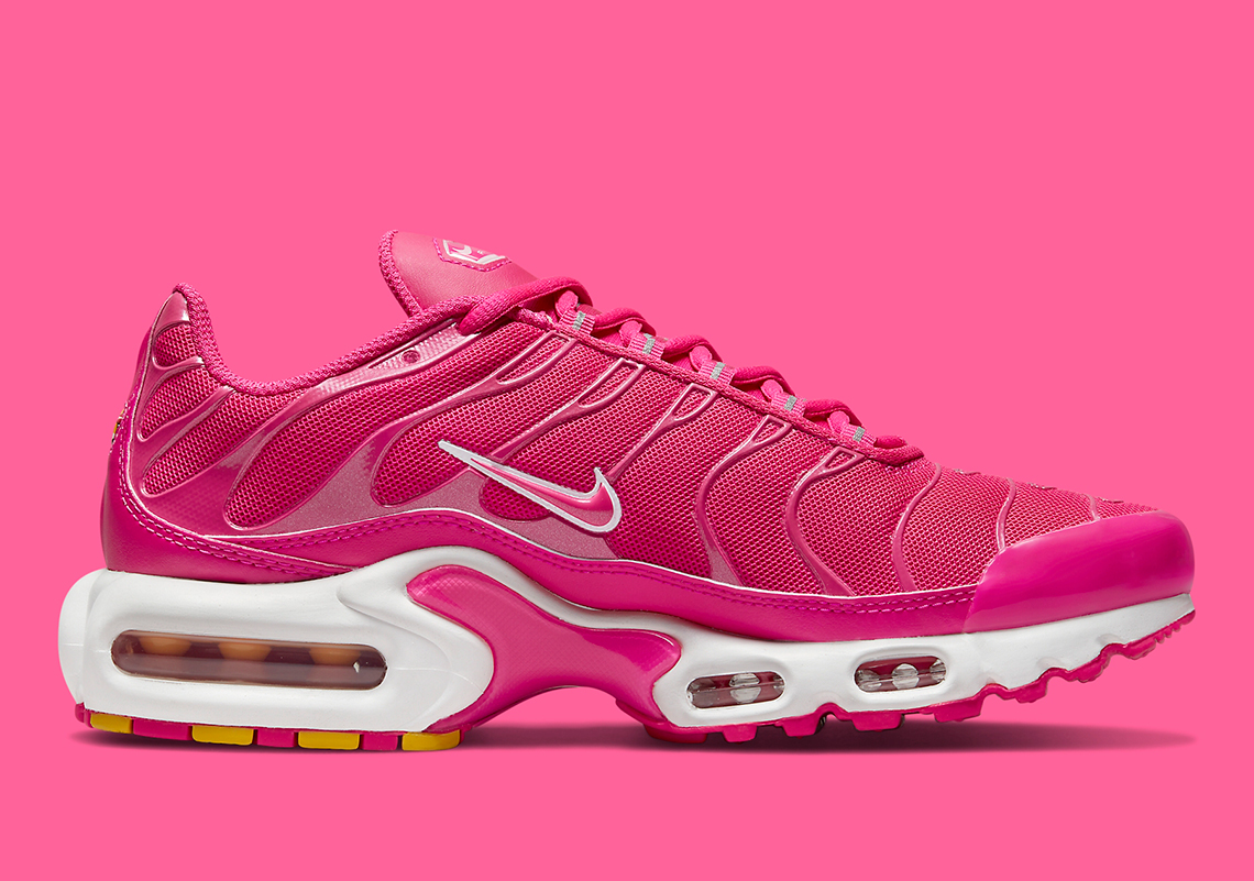pink blue and yellow air max plus