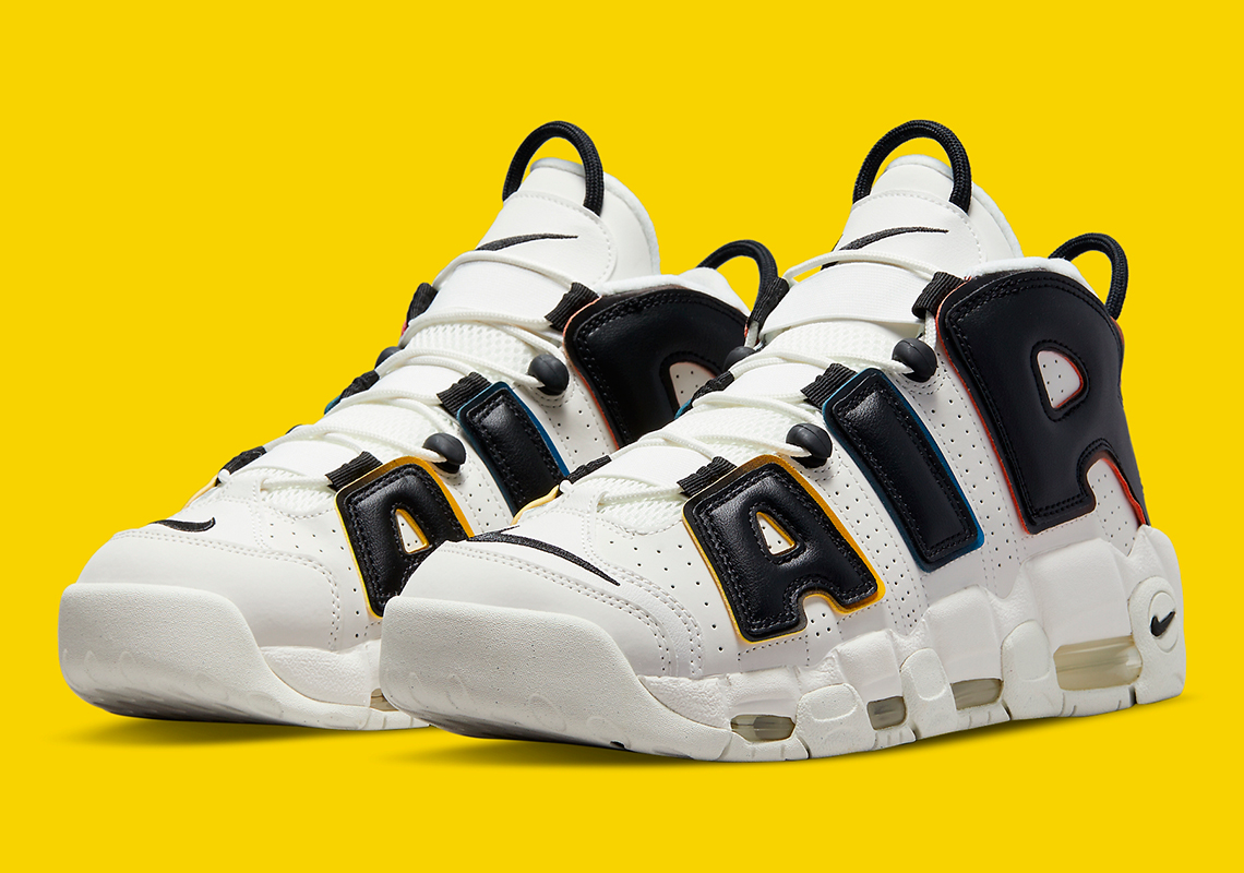 nike uptempo black and yellow