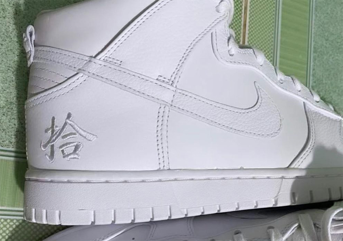 An All-White Nike Dunk High With Eastern Influence And Woven Tongues Appear