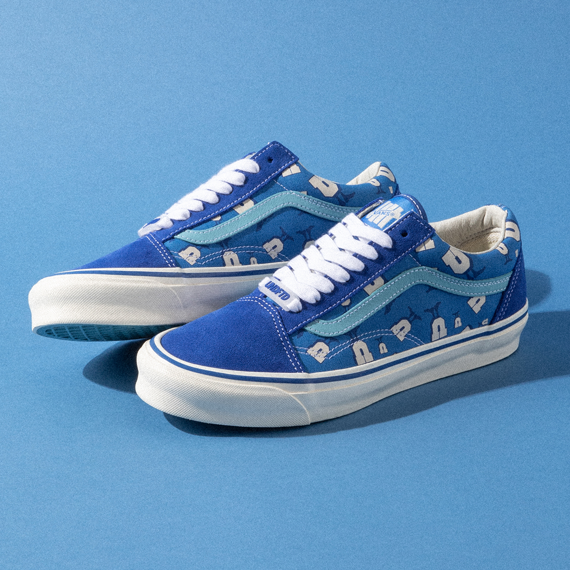 blue vans with vans logo