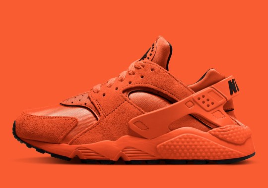 Nike Covers Almost Every Part Of The Air Huarache With A Bright Orange