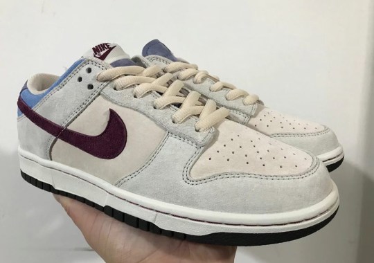 Nike Adds A Hint Of Blue And Purple To This Otherwise Simple Dunk Low