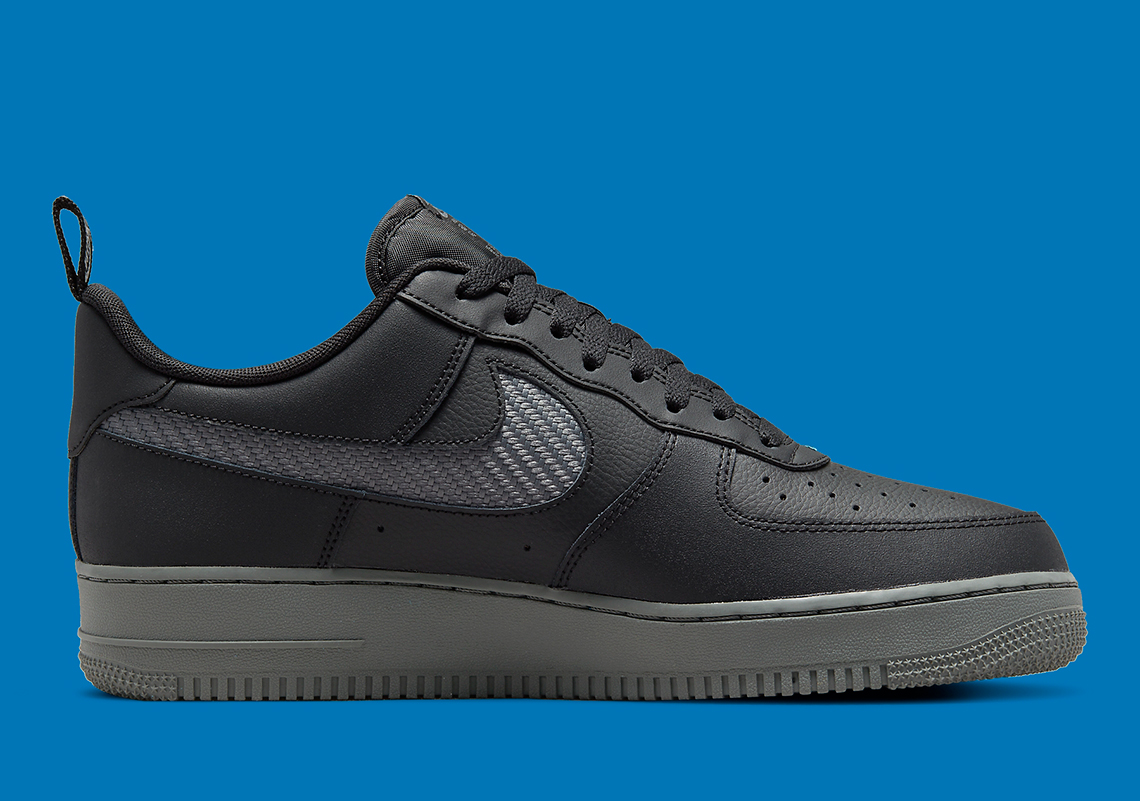 nike air force 1 black with blue swoosh