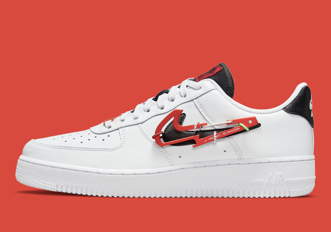 Nike Adds A Swoosh-Shaped Carabiners Onto The Air Force 1