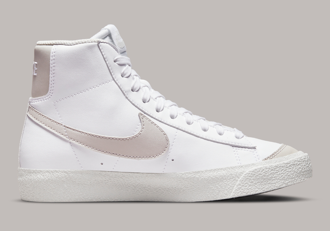 white and grey nike blazers