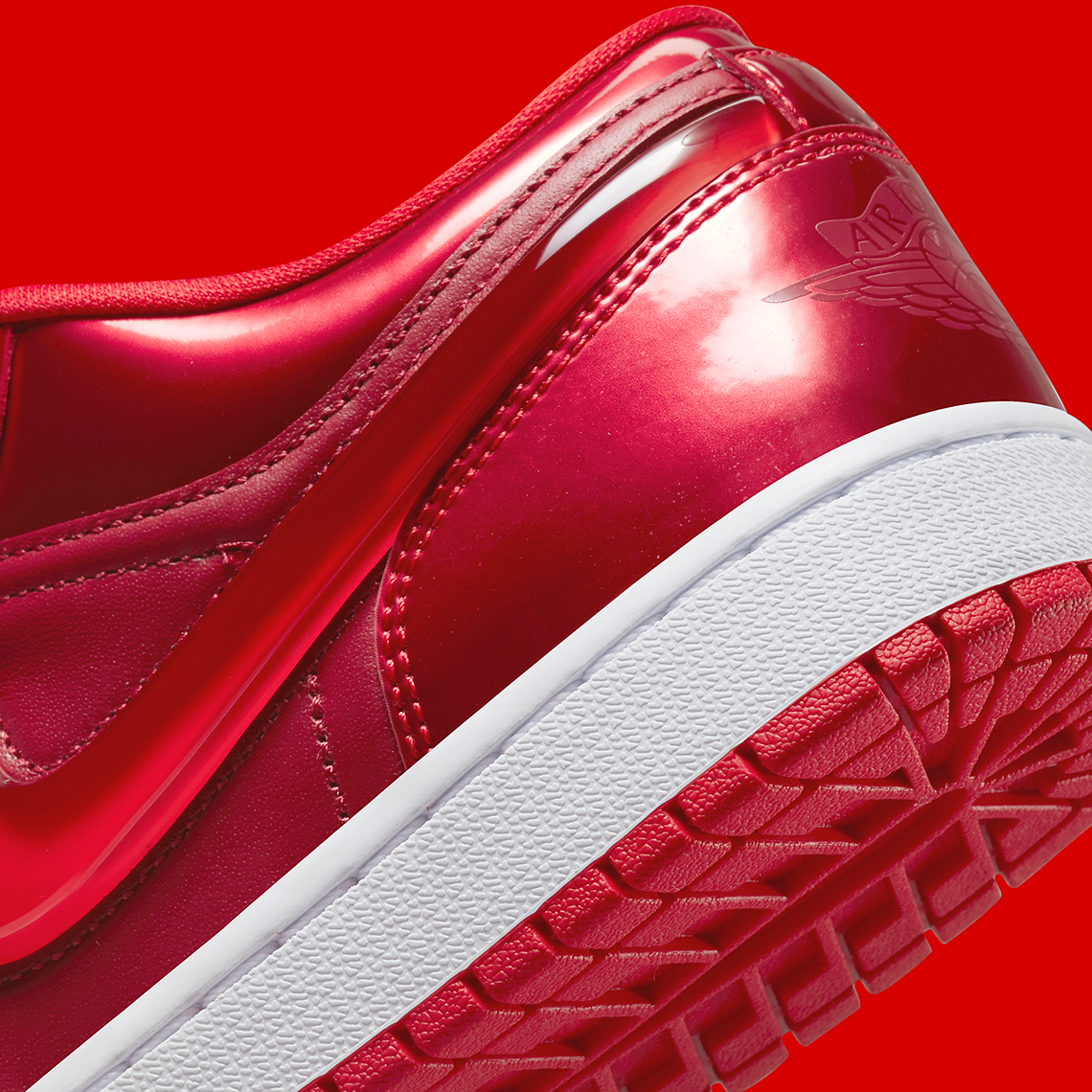 SBD, Air Jordan 1 Low Pomegranate Features Large Jeweled Swooshes