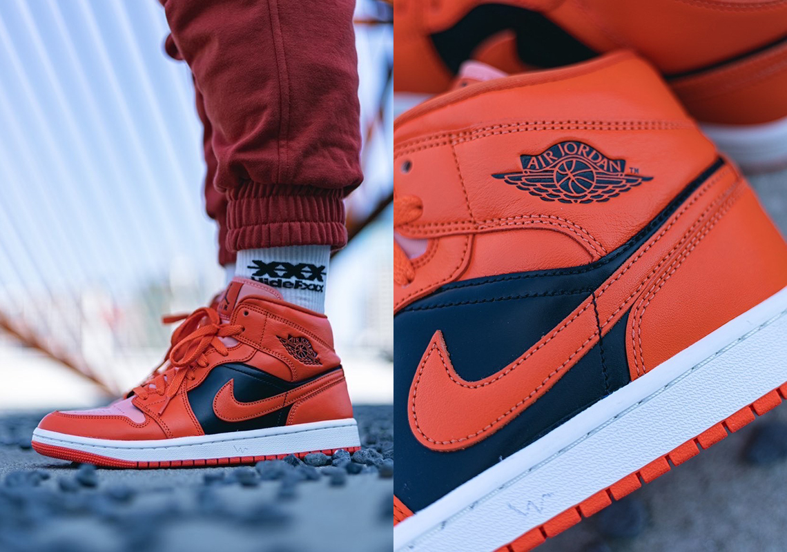 black orange jordan 1 mid